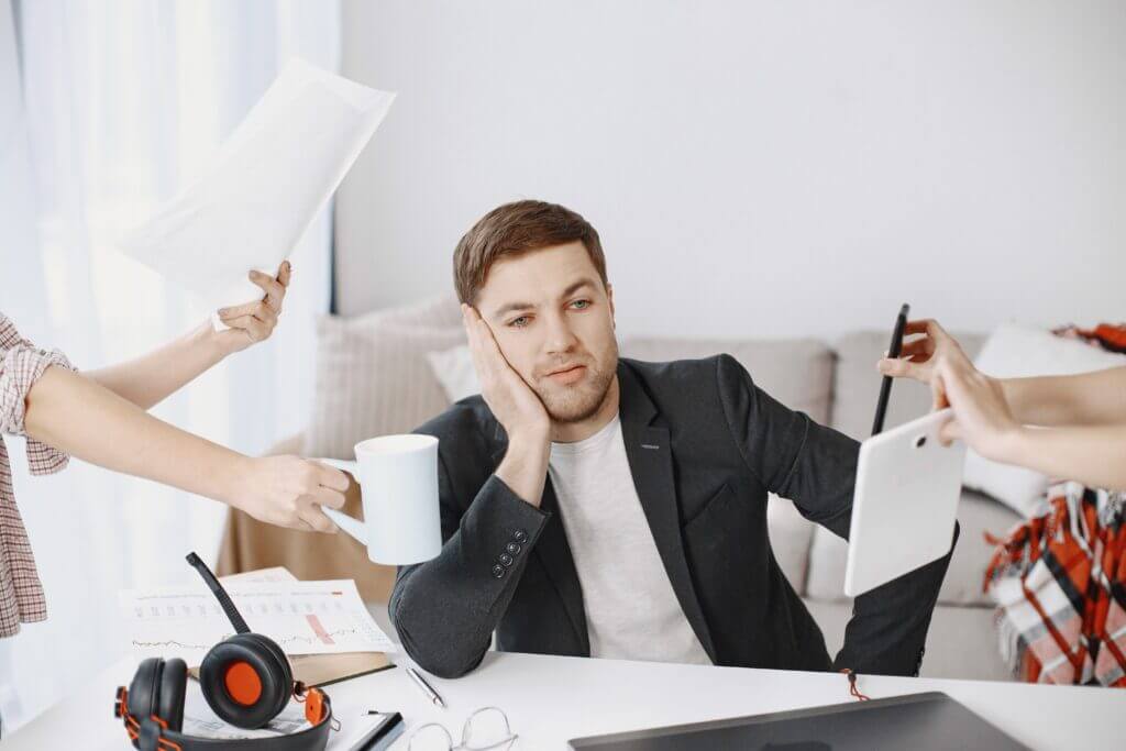 Overwhelmed professional juggling multiple demands while appearing to suffer from adhd vs chronic fatigue