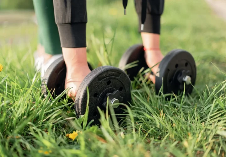 Woman exercising outdoors as part of a healthy lifestyle for hair loss treatment