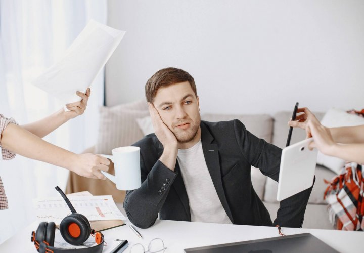 Overwhelmed professional juggling multiple demands while appearing to suffer from adhd vs chronic fatigue